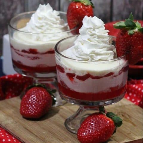 With fresh strawberries, ricotta, and crumbled red velvet cookies, these Red Velvet Strawberry Parfaits are a delicious dessert perfect for Valentine's Day of any day of the year.