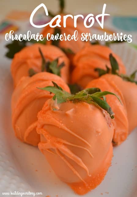 Orange chocolate covered Strawberries that resemble carrots for Easter.