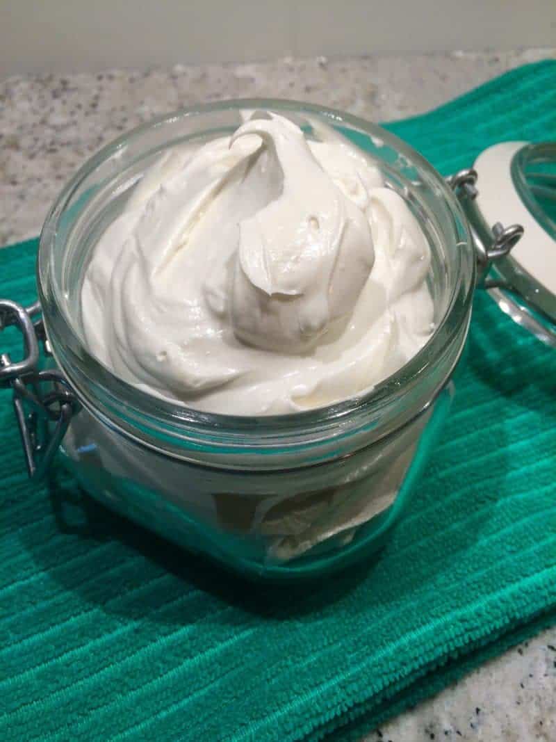 Whipped body butter in glass jar.