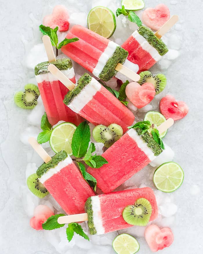 Watermelon Coconut Mint Ice pops layered to look like watermelon slices.