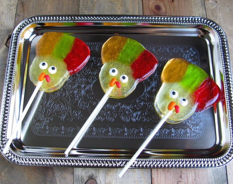 Three turkey lollipops on serving tray.