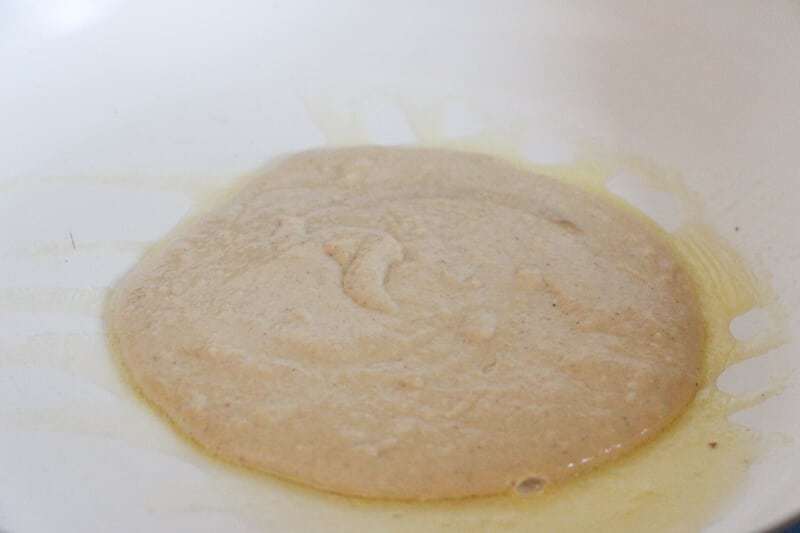 Pancake batter in pan.