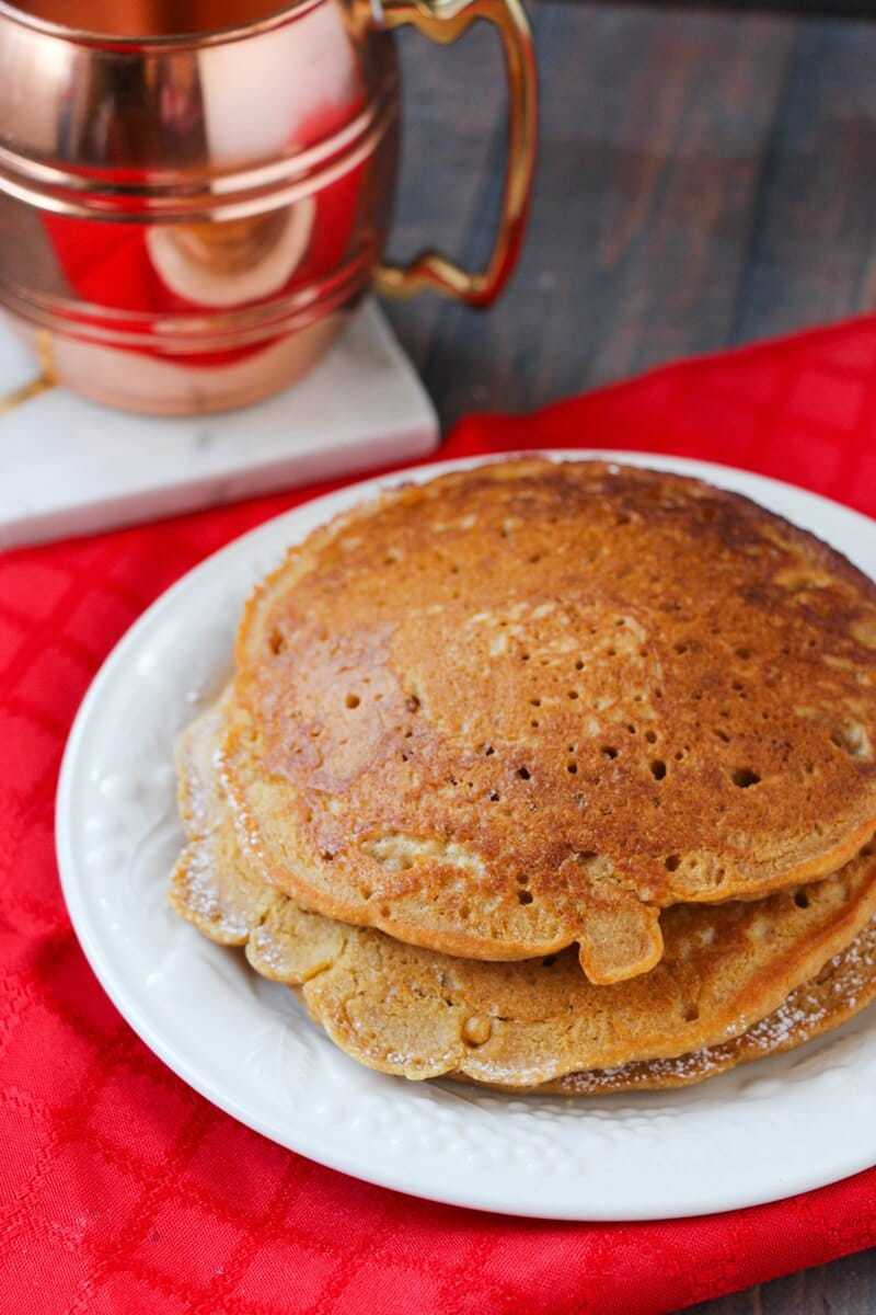 Gingerbread Pancakes on white plate.