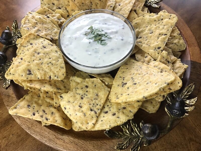 Bacon ranch dip topped with basil.