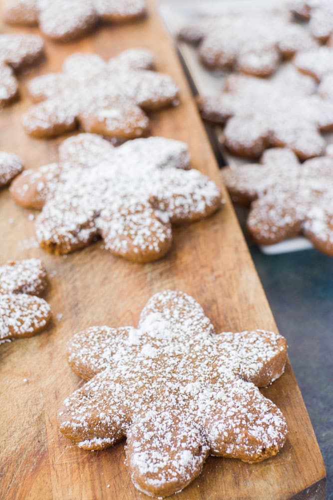 Star shaped gingerbread cookies with powdered sugar on top