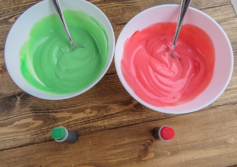 One bowl of green pudding and one bowl of red pudding.