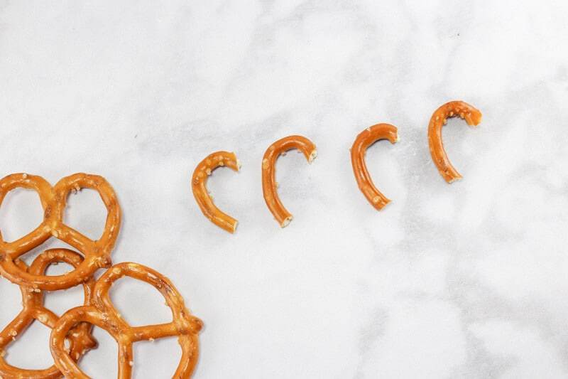 Pretzels broken to small pieces that look like handles or candy canes.