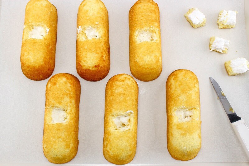 6 Twinkies with squares cut out of the top to place Peeps.