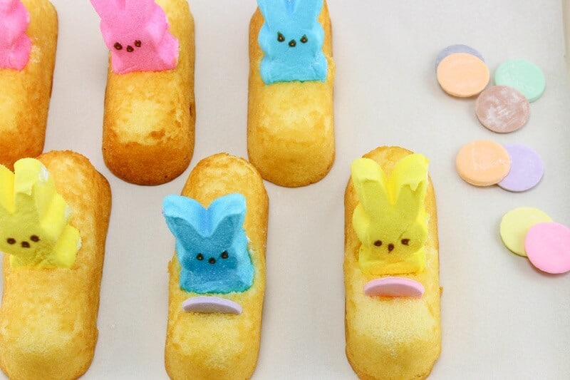Peeps placed in the holes made in Twinkies and Nicco waffers placed in front of them to look like steering wheels.