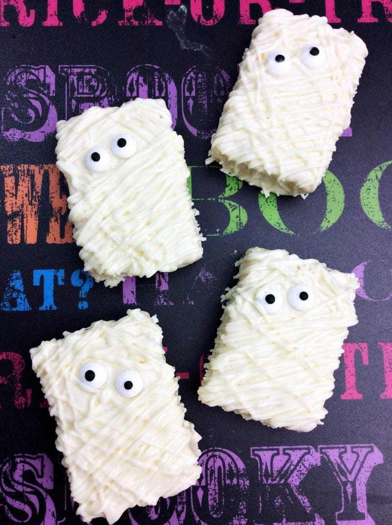 Four Mummy Rice Krispie Treats. 