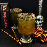 This citrus and sour apple Demon Juice Halloween Cocktail has a powerful punch that will pucker your lips and leave you begging for more.