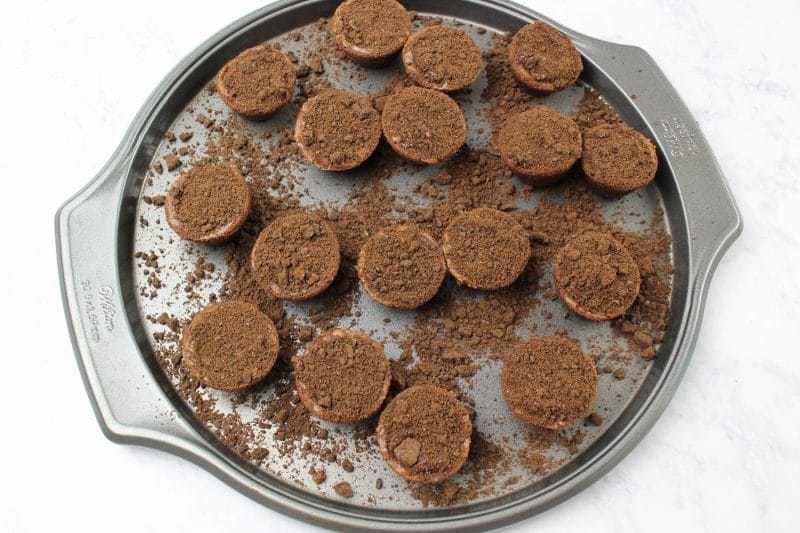 Brownie bites topped with chocolate cookie crumbs.