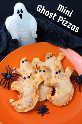 Mini Ghost Pizzas are quick and easy to prepare and make the perfect dinner or snack for all the ghosts and ghouls at your Halloween Party.