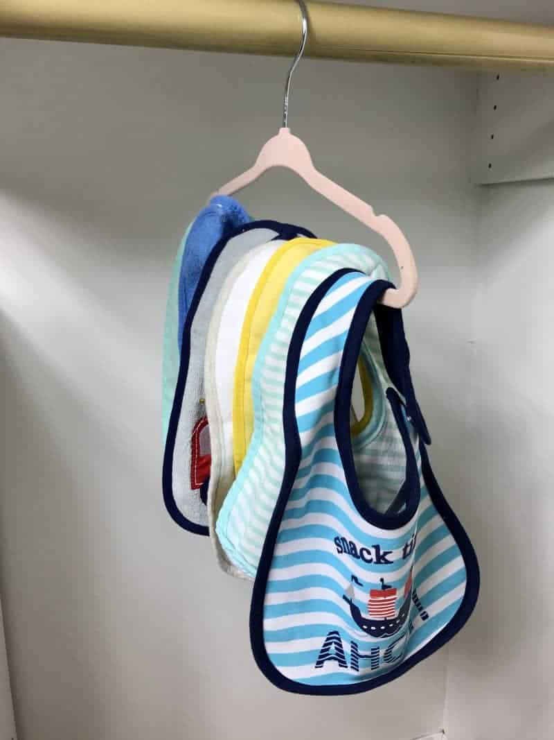 https://crayonsandcravings.com/wp-content/uploads/2017/10/Nursery-Storage-and-Organization-Ideas-Hang-Bibs.jpg