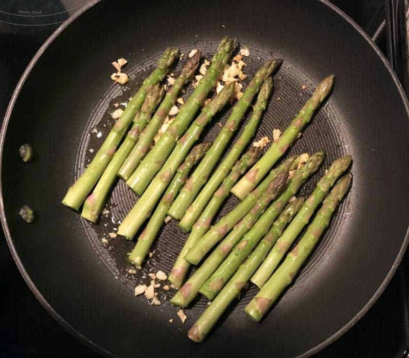 Quick, easy, and delicious Pan Seared Asparagus With Soy Sauce and Garlic takes only about 15 minutes to make, and pairs well with steak, chicken, or fish.