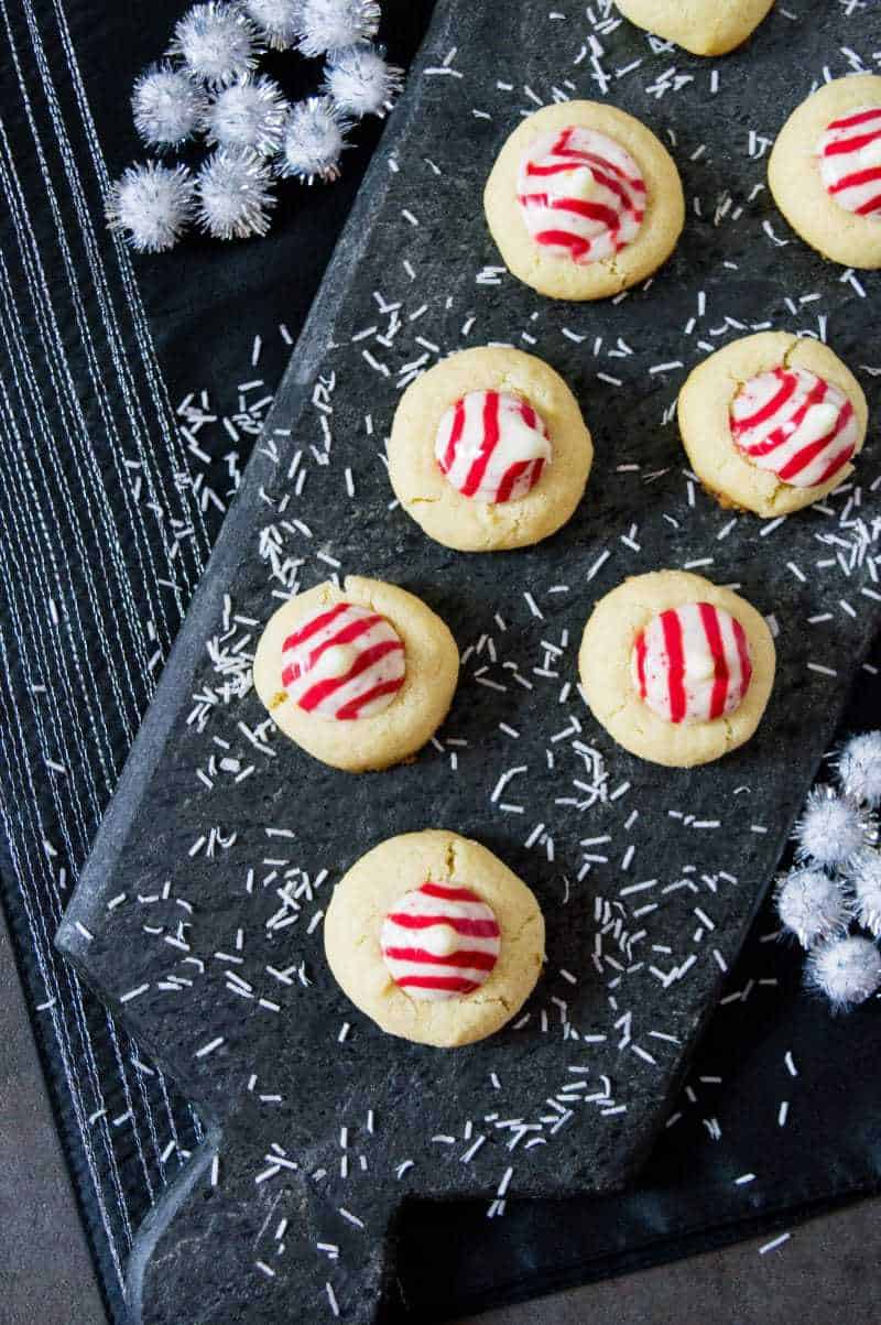 Not only do these Candy Cane Hershey Kiss Cookies look festive, but these holiday cookies have a festive peppermint flavor as well.