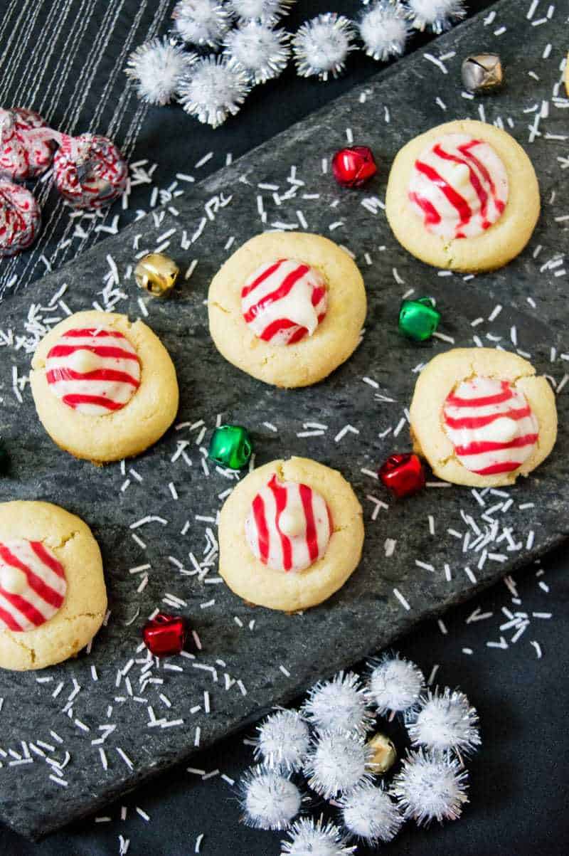 Not only do these Candy Cane Hershey Kiss Cookies look festive, but these holiday cookies have a festive peppermint flavor as well.