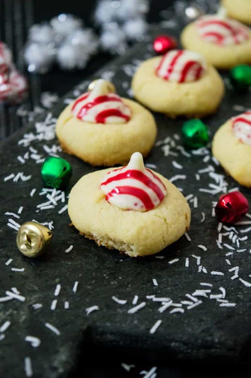 Not only do these Candy Cane Hershey Kiss Cookies look festive, but these holiday cookies have a festive peppermint flavor as well.