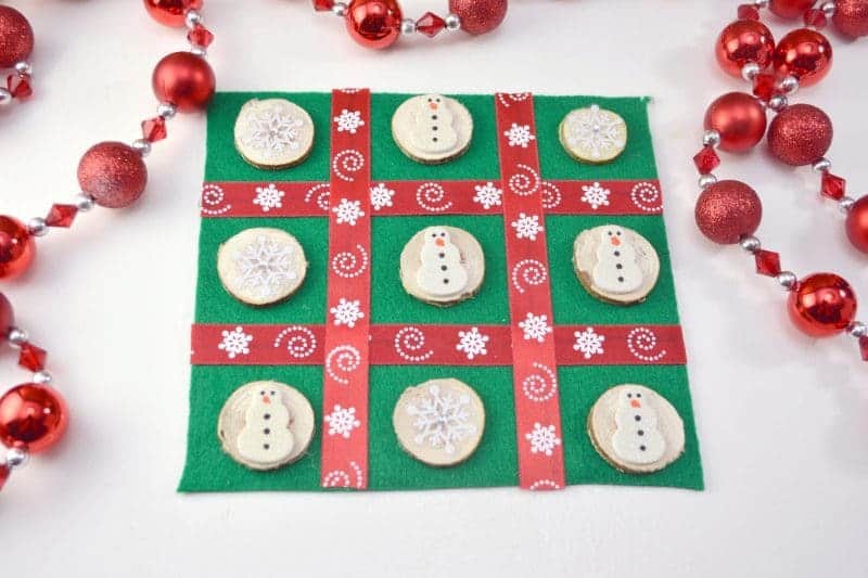 This DIY Christmas Tic Tac Toe board is an easy to make holiday craft perfect for the kids to make as homemade gifts for their classmates and friends.