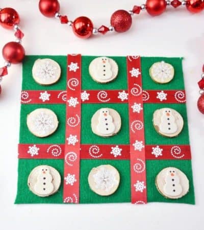 This DIY Christmas Tic Tac Toe board is an easy to make holiday craft perfect for the kids to make as homemade gifts for their classmates and friends.