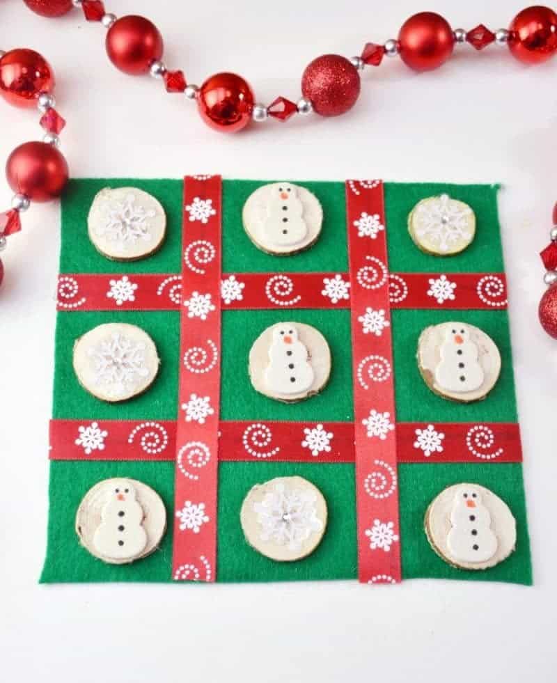 This DIY Christmas Tic Tac Toe board is an easy to make holiday craft perfect for the kids to make as homemade gifts for their classmates and friends.