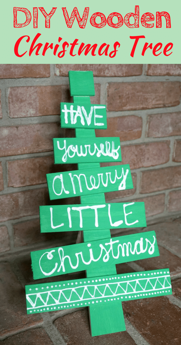 This DIY holiday phrase wooden Christmas tree is the perfect easy DIY Christmas decoration idea. It will make a great addition to your holiday decor.