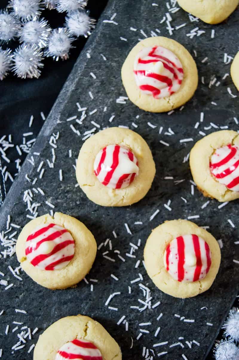 Not only do these Candy Cane Hershey Kiss Cookies look festive, but these holiday cookies have a festive peppermint flavor as well.