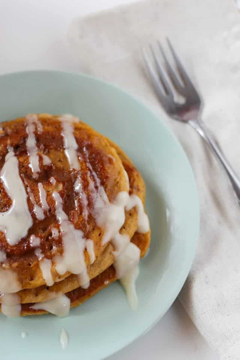 With a cinnamon swirl and a cream cheese glaze, these pumpkin spice pancakes will become a family favorite throughout the fall months and especially on Thanksgiving morning.