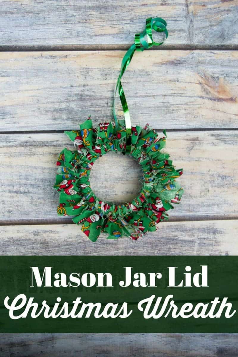 Mason canning jar lid Christmas wreath ornaments are great  for giving your tree that homemade rustic feel, and can be customized with any color fabric.