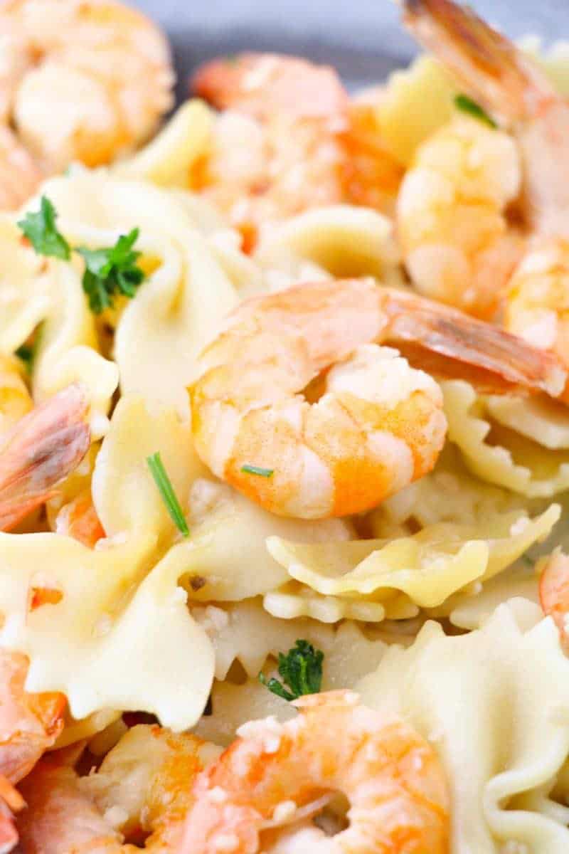 This delicious and simple instant pot shrimp scampi recipe takes minutes to make and can be served over pasta or rice for a quick and tasty dinner.