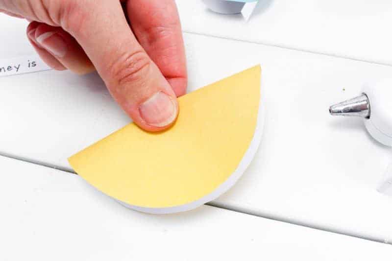 This paper fortune cookies craft will make a fun favor and decoration for your New Year's Eve party! Fill the paper fortune cookies with fun predictions for the New Year for your guests.