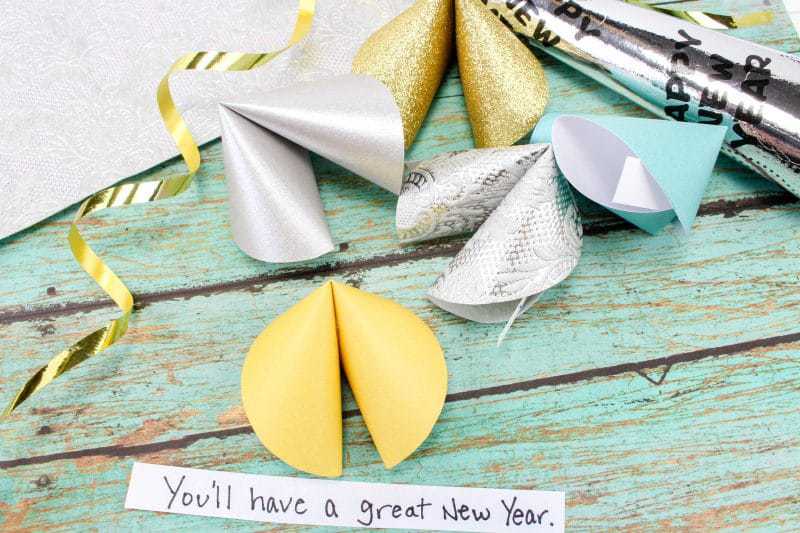 This paper fortune cookies craft will make a fun favor and decoration for your New Year's Eve party! Fill the paper fortune cookies with fun predictions for the New Year for your guests.