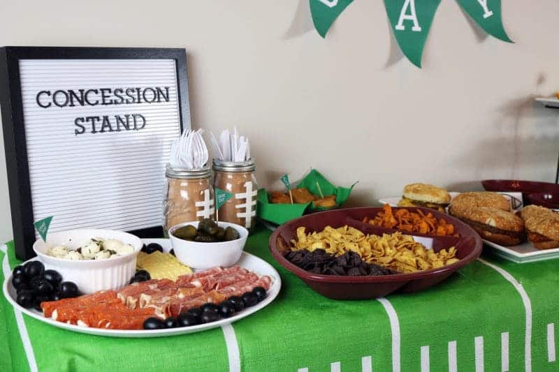 A fun and easy football themed party spread including a recipe for mini mac & cheese cups. Also included are a DIY Game Day banner printable, DIY Game Day toothpick topper printable, and printable football buffet table labels all available for download - for free!