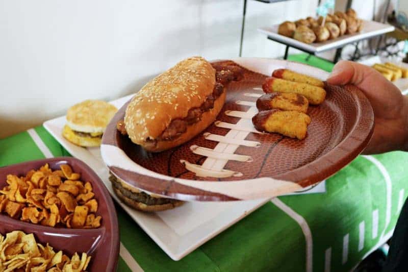 A fun and easy football themed party spread including a recipe for mini mac & cheese cups. Also included are a DIY Game Day banner printable, DIY Game Day toothpick topper printable, and printable football buffet table labels all available for download - for free!