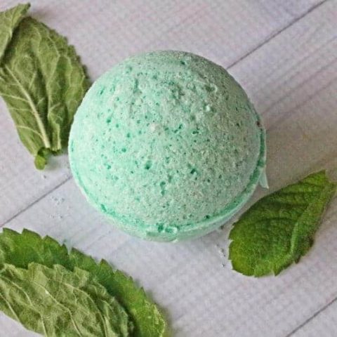 Get headache relief naturally with a nice hot bath and a homemade headache bath bomb. Made with soothing lavender and peppermint essential oils, this natural headache remedy is easy to make right at home.