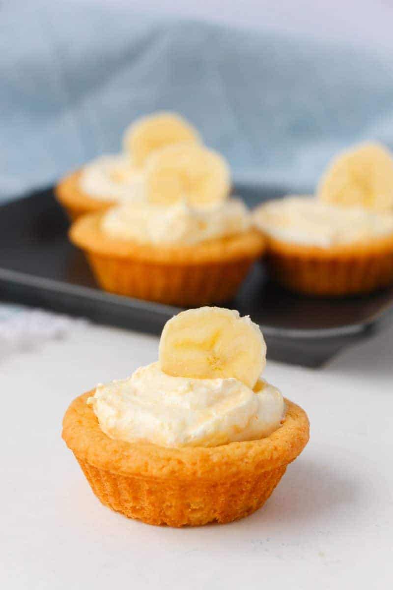 Moist, creamy, and delicious banana cream cookie cups are easy to make with sugar cookie dough and banana pudding mix. Even the little ones can get in the kitchen and help make these easy and delicious treats!