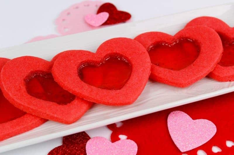 Are you looking for a unique cookie that your kids will absolutely love? These Valentine stained glass heart cookies are a must for Valentine’s Day. Not only do you get the delicious sugar cookie, but you also get yummy candy. It’s two treats in one! What kid would be able to resist?