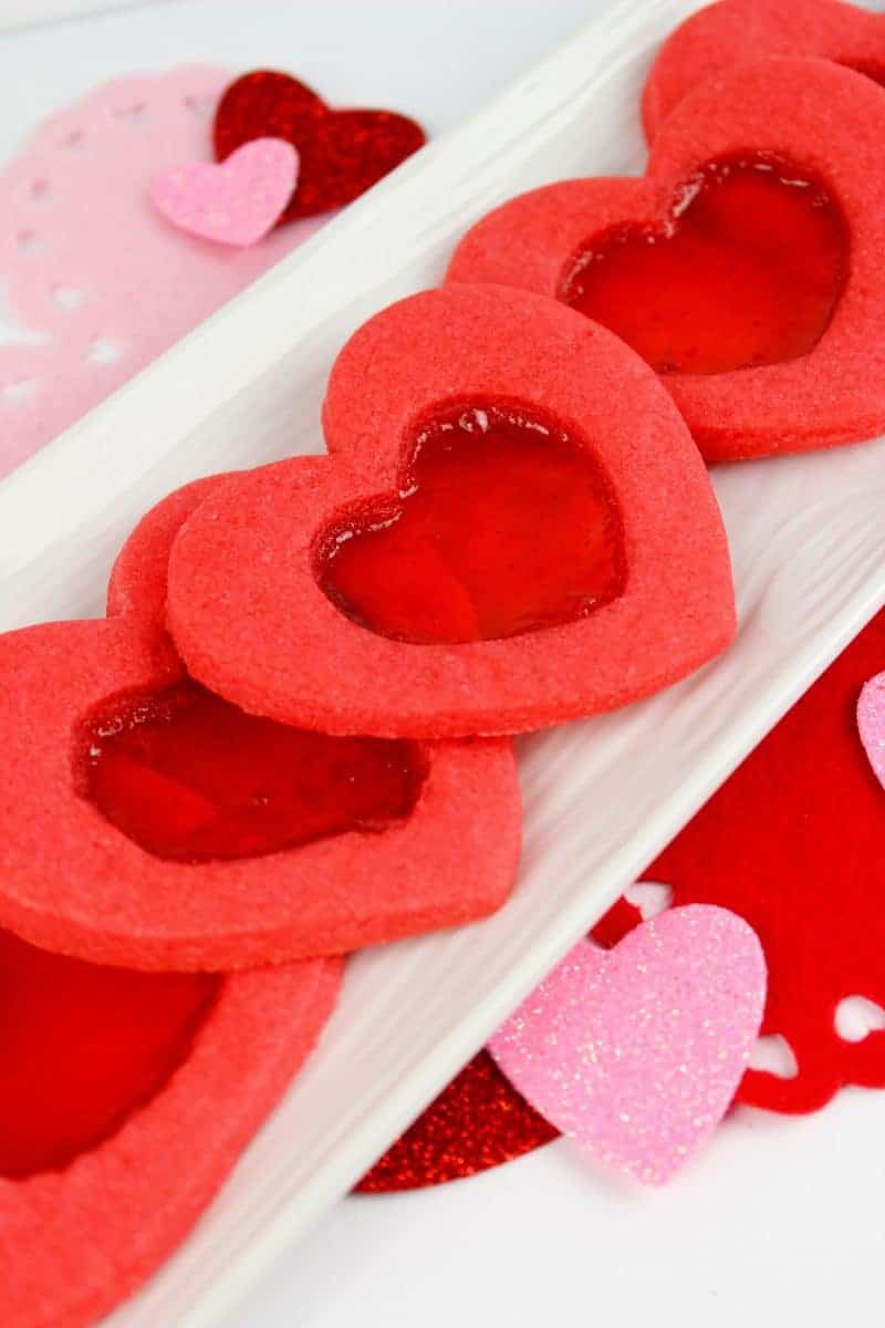 Are you looking for a unique cookie that your kids will absolutely love? These Valentine stained glass heart cookies are a must for Valentine’s Day. Not only do you get the delicious sugar cookie, but you also get yummy candy. It’s two treats in one! What kid would be able to resist?