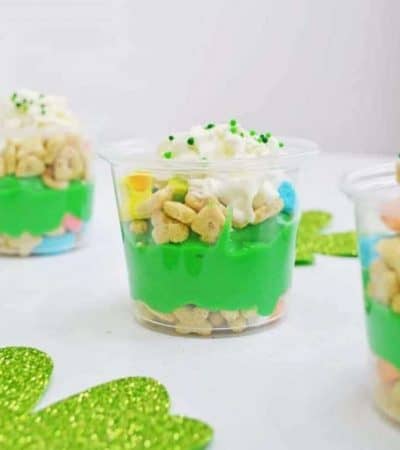 I love how quick and easy these St. Patrick's Day Pudding Parfaits are to make! Simply layer Lucky Charms cereal, pudding, and whipped cream to make this easy, festive, and delicious St. Patrick's Day dessert.