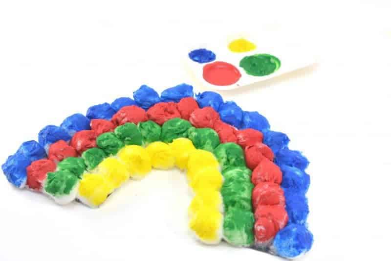 If you are looking for a rainbow kids craft for St. Patrick's Day or just for Spring in general, this colorful Hanging Cotton Ball Rainbow Craft for Kids is the perfect idea.