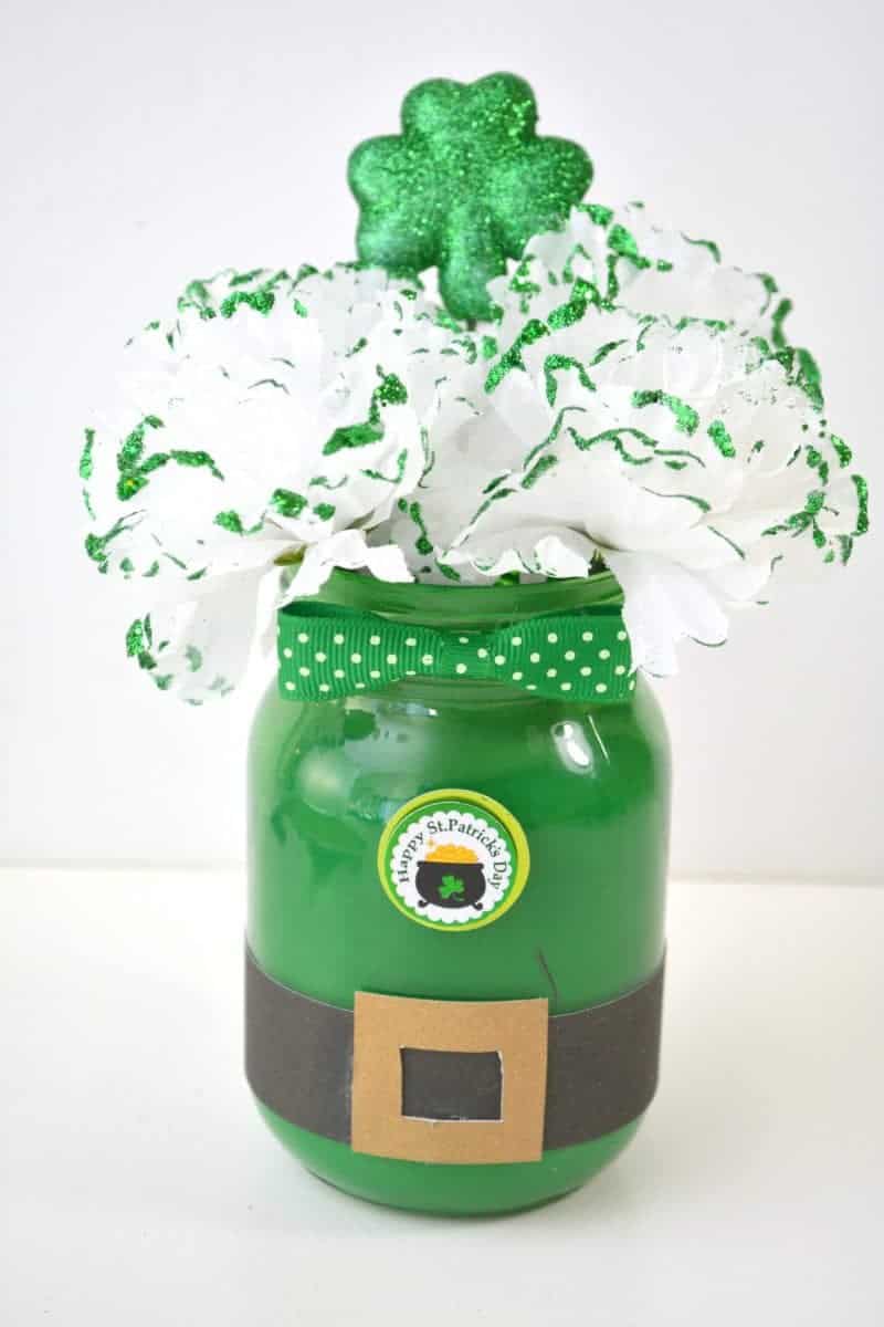 Are you looking for a DIY St. Patrick's Day Decoration idea? This Leprechaun Mason Jar craft is quick and easy to make, and would be perfect as a St. Patrick's Day centerpiece of as a DIY decoration for your St. Patrick's Day party.