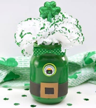 Are you looking for a DIY St. Patrick's Day Decoration idea? This Leprechaun Mason Jar craft is quick and easy to make, and would be perfect as a St. Patrick's Day centerpiece of as a DIY decoration for your St. Patrick's Day party.