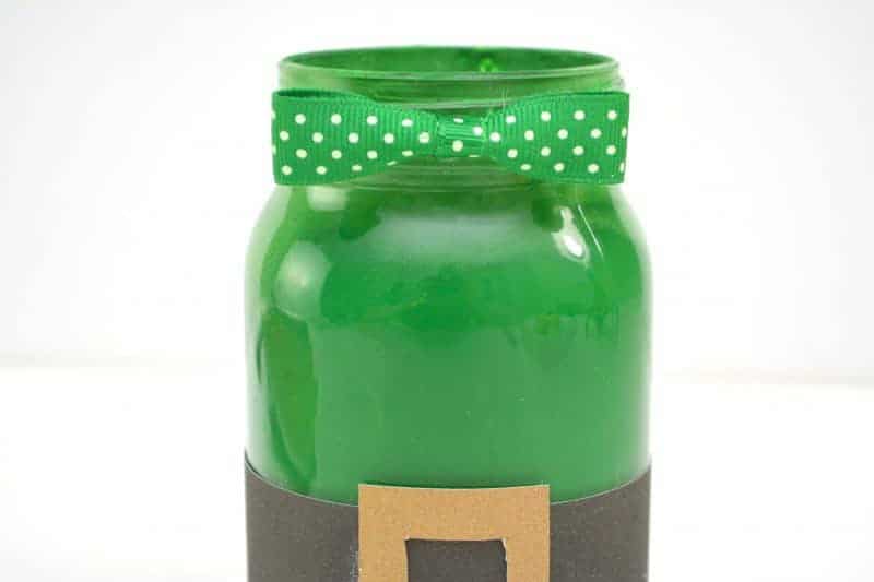 Are you looking for a DIY St. Patrick's Day Decoration idea? This Leprechaun Mason Jar craft is quick and easy to make, and would be perfect as a St. Patrick's Day centerpiece of as a DIY decoration for your St. Patrick's Day party.