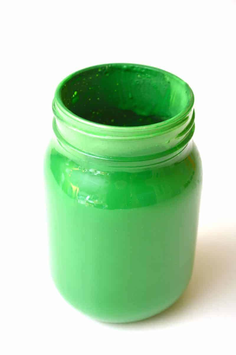 Are you looking for a DIY St. Patrick's Day Decoration idea? This Leprechaun Mason Jar craft is quick and easy to make, and would be perfect as a St. Patrick's Day centerpiece of as a DIY decoration for your St. Patrick's Day party.