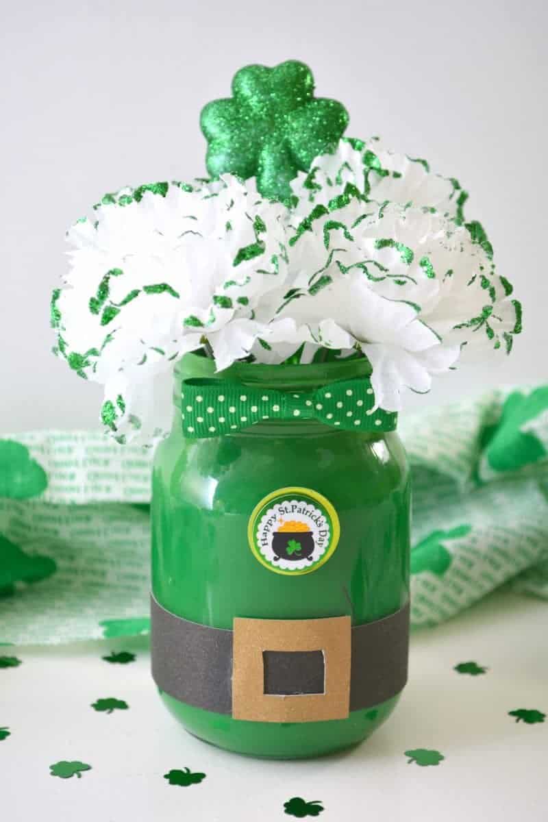 Are you looking for a DIY St. Patrick's Day Decoration idea? This Leprechaun Mason Jar craft is quick and easy to make, and would be perfect as a St. Patrick's Day centerpiece of as a DIY decoration for your St. Patrick's Day party.