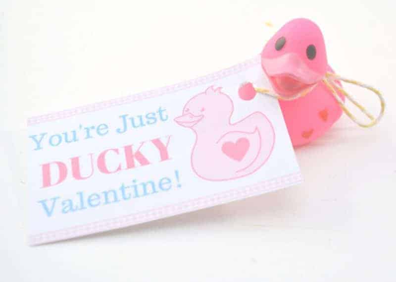 Are you looking for super cute free Valentine printables for your kids to give out this Valentine’s Day? This DIY “You’re Just Ducky” kids valentine is so stinking cute and is very inexpensive to make for the entire class. Plus, these homemade Valentines are something that will  put store-bought valentines to shame!