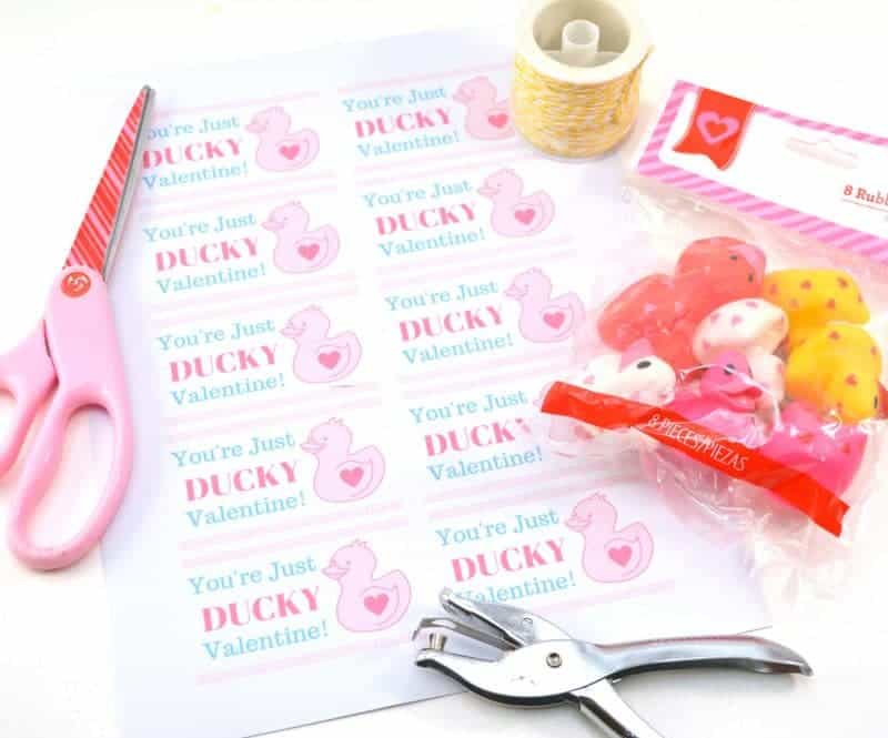 Are you looking for super cute free Valentine printables for your kids to give out this Valentine’s Day? This DIY “You’re Just Ducky” kids valentine is so stinking cute and is very inexpensive to make for the entire class.