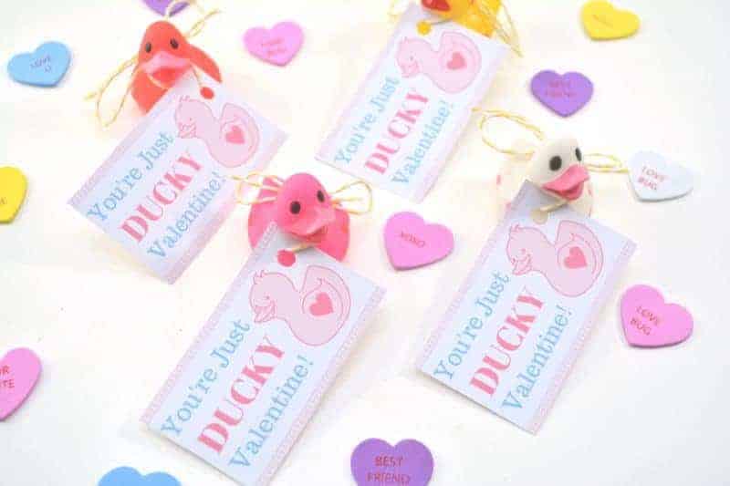 Are you looking for super cute free Valentine printables for your kids to give out this Valentine’s Day? This DIY “You’re Just Ducky” kids valentine is so stinking cute and is very inexpensive to make for the entire class.