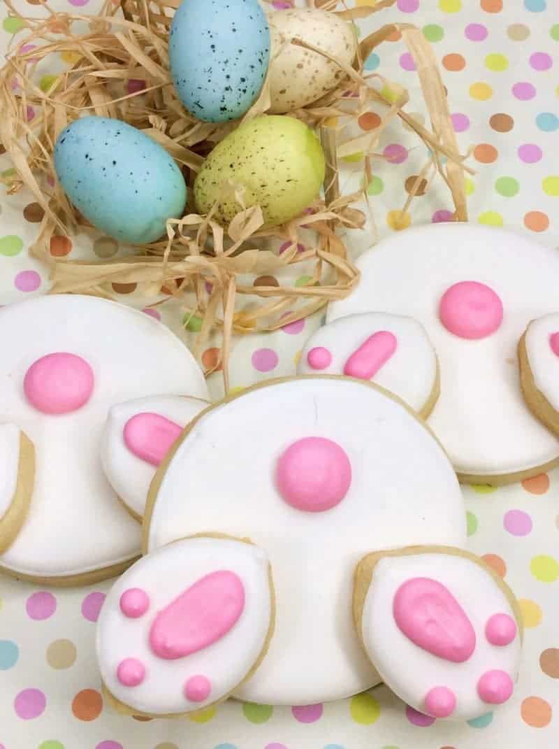 Adorable Easter Bunny butt cookies make a super cute Easter dessert treat for the little ones. Make these fun Easter cookies with this from scratch recipe or buy sugar cookie dough and icing to save some time!