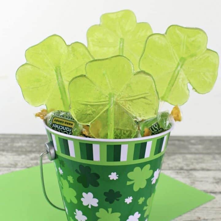 These beautiful green shamrock lollipops will make the perfect treat for your St. Patrick's Day party. You will not believe how easy they are to make!